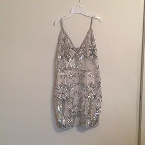 Sequin mesh cocktail dress.